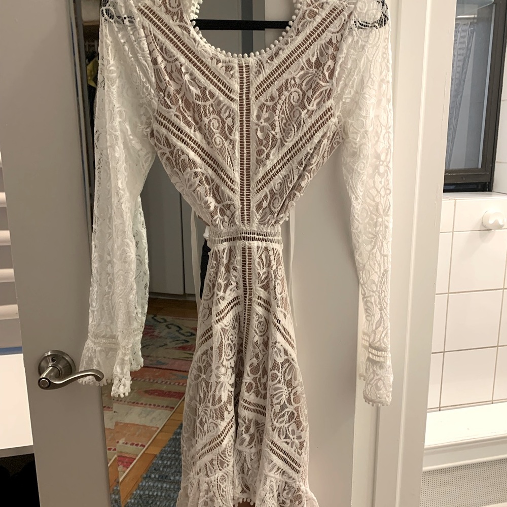 For love and lemons white open back dress!